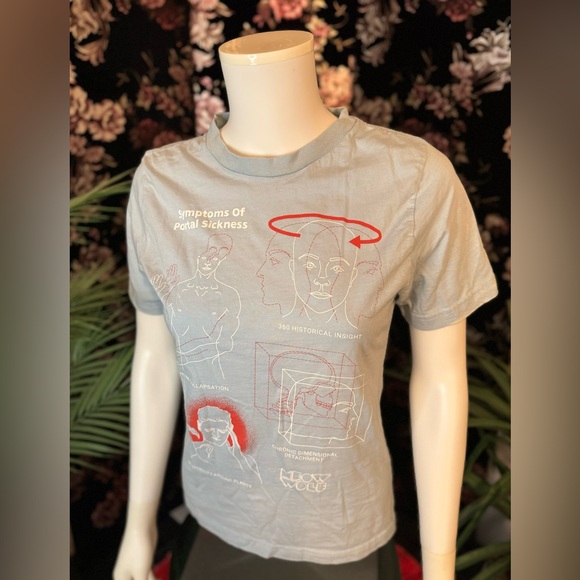 MEOW WOLF Symptoms Of Portal Sickness Baby Blue Graphic Tee Size Small - Picture 2 of 6